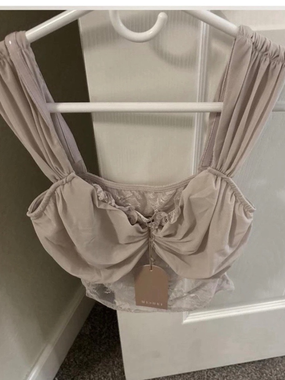 Meshki brand new with the tag size large $98